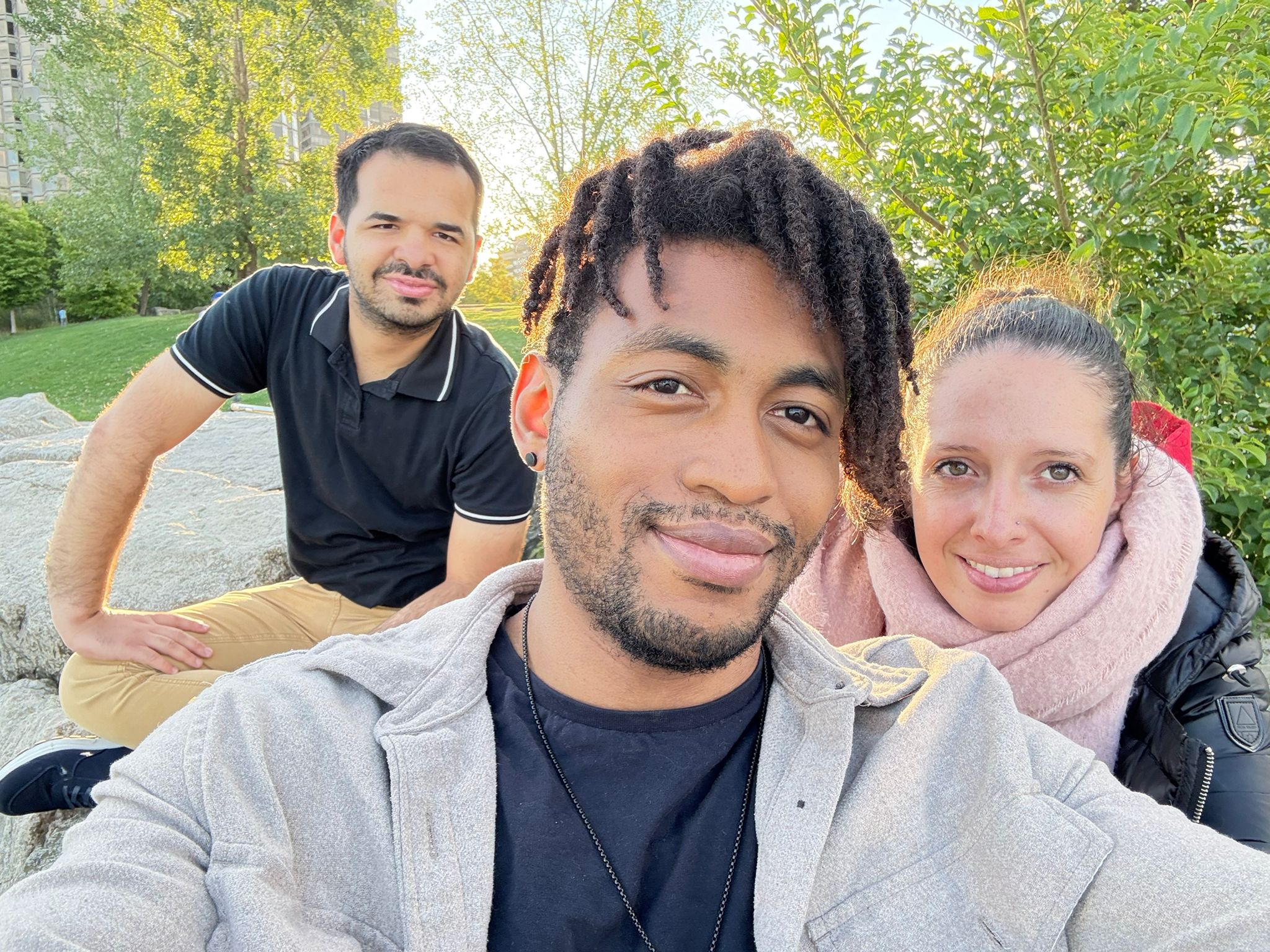 Summer park scene with three friends